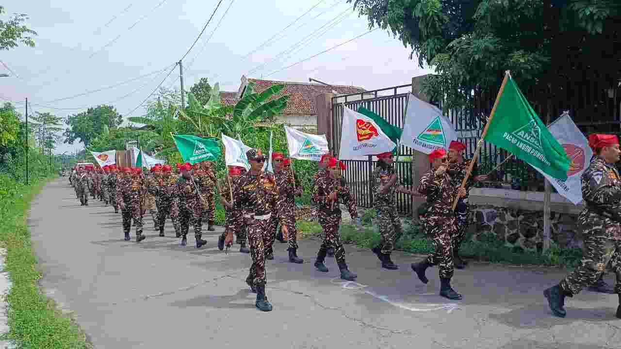PAC GP Ansor Pungging Gelar Apel Pasukan dan Long March Ideologis, Teguhkan Khidmat Ulama Sambut Abad Kedua NU